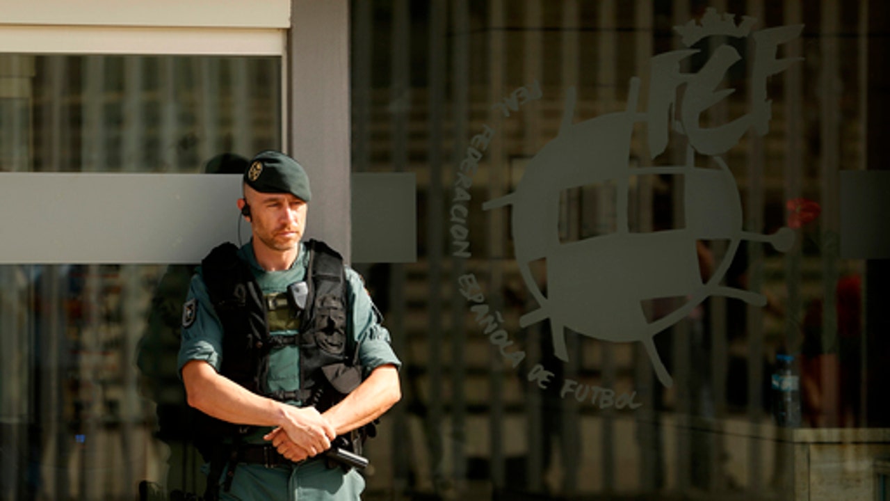 Police arrest Spanish soccer federation president and son
